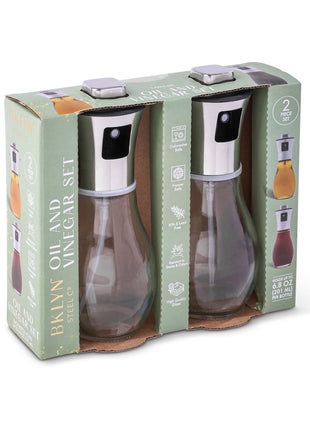 Side view of Core Home 2 pack oil spray bottle set with glass bottles