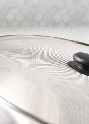 Stainless steel mesh splatter guard for reducing stovetop oil splatter